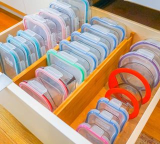 Food storage containers organized in a drawer