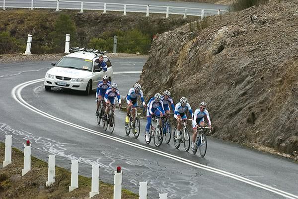 The team from Lawson Homes climbs out of Queenstown as team manager Ken Lawson yells encouragement from the following support vehicle.