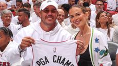 Brooks Koepka attends a Miami Heat game in the NBA