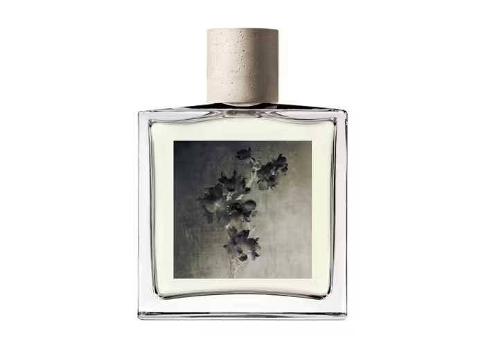 Perfume packaging design with an atmospheric black and white flower