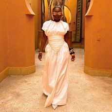 Fisayo Longe in white maxi dress and sunglasses