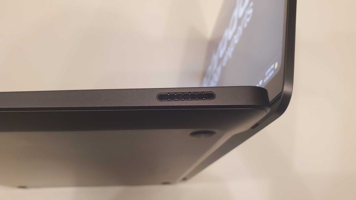 black laptop on white table