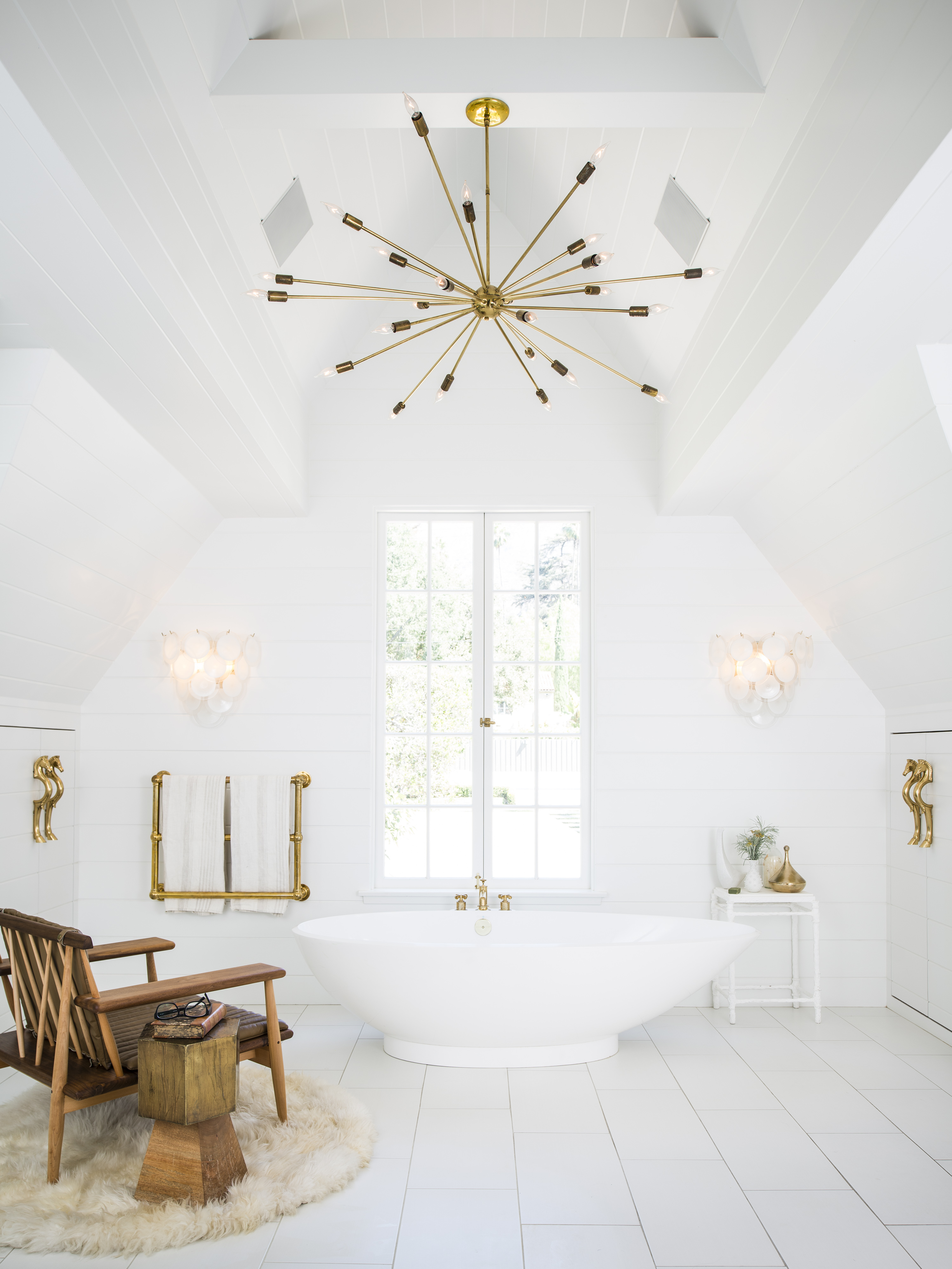 eco bathroom with white bath and white wood flooring