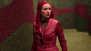 Kylie Cantrall walking in a maze in Descendants: Wicked Wonderland. 