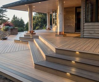 wooden deck with steps and integrated lighting