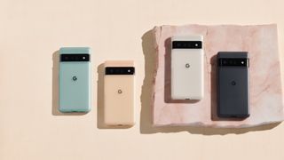 Four Google Pixel 6 Pro handsets in a line