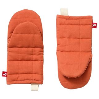 Two orange oven mitts from Hedley & Bennett