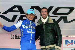 Filippo Pozzato (Quick.Step) with Mario Cipollini on the podium