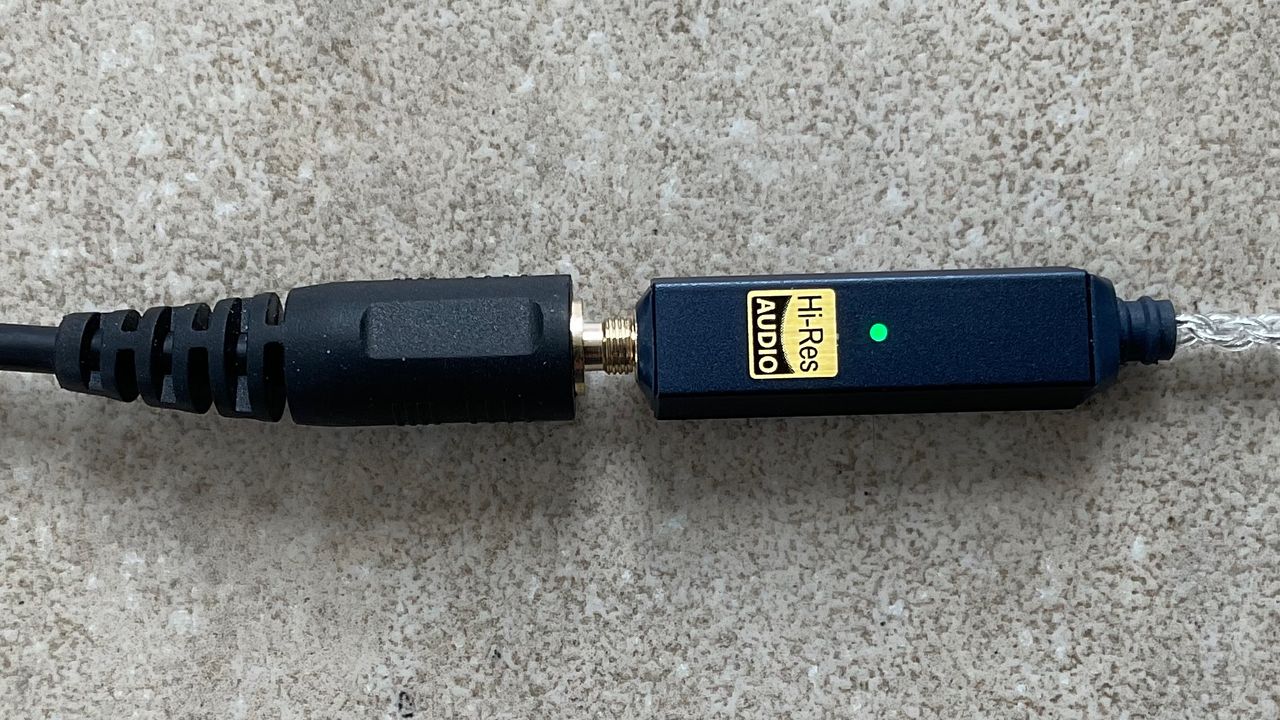 iFi GO Link 2 shot on a grey surface