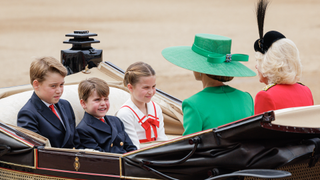 Prince George of Wales, Princess Charlotte of Wales and Prince Louis of Wales ride in a horse drawn carriage with Catherine, Princess of Wales and Queen Camilla during Trooping the Colour at Horse Guards Parade on June 17, 2023 in London, England