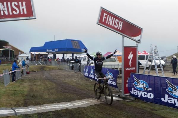 Lachlan Norris wins the elite men's short track at Mt. Buller in tough conditions.