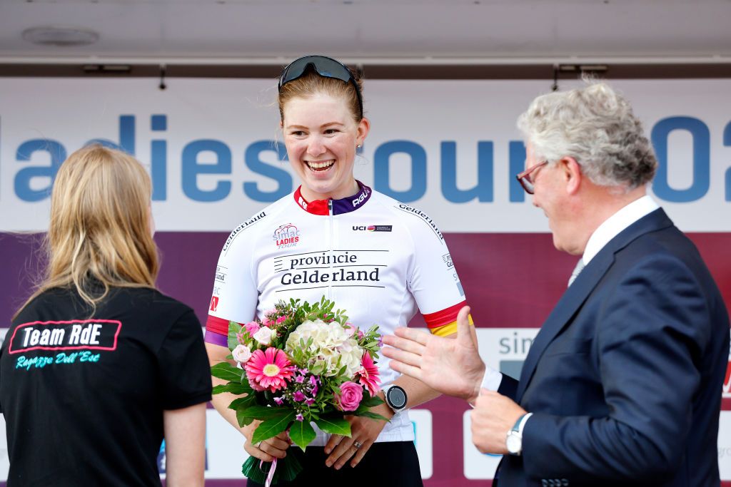 EDE NETHERLANDS AUGUST 31 Lonneke Uneken of Netherlands and Team SD Worx and Team SD Worx celebrates winning the White Best Young Jersey on the podium ceremony after 25th Simac Ladies Tour 2022 Stage 2 a 1178km stage from Ede to Ede SLT2022 UCIWWT on August 31 2022 in Ede Netherlands Photo by Bas CzerwinskiGetty Images