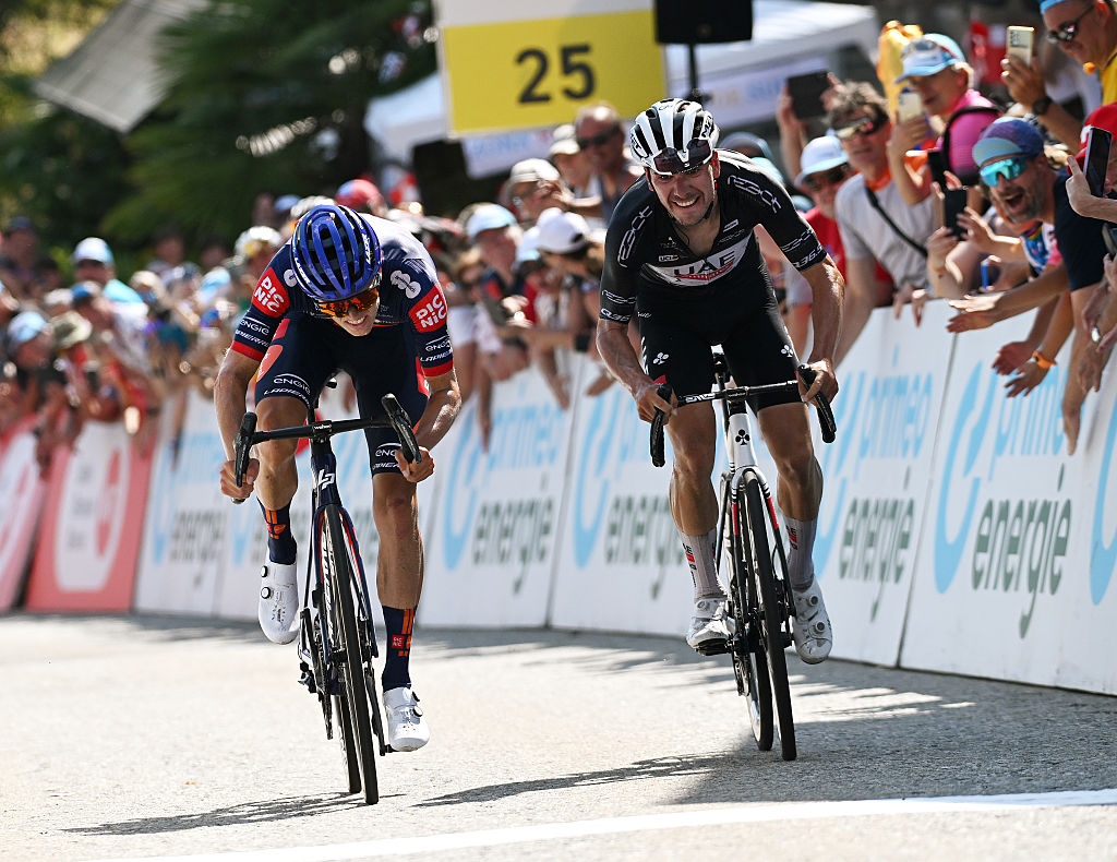 SANTA MARIA IN CALANCA, SWITZERLAND - JUNE 19: (L-R) Oscar Onley of Great Britain and Team Picnic PostNL and Joao Almeida of Portugal and UAE Team Emirates - XRG - Black Points Jersey sprint at finish line to win the 88th Tour de Suisse, Stage 5 a 183.8km stage from La Punt to Santa Maria in Calanca 941m / #UCIWT / on June 19, 2025 in Santa Maria in Calanca, Switzerland. (Photo by Tim de Waele/Getty Images)