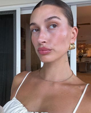 Hailey Bieber selfie with glowing skin