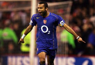 Ashley Cole celebrates after scoring for Arsenal against Sheffield United in the FA Cup in March 2005.