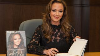 Leah Remini posing with her memoir