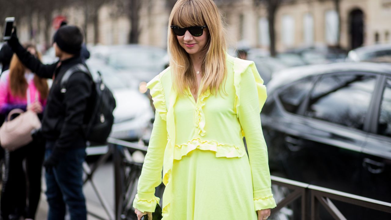 Street fashion, Clothing, Fashion, Yellow, Trench coat, Outerwear, Coat, Snapshot, Eyewear, Sunglasses, 