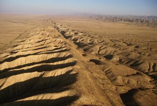 The San Andreas fault system is more than 800 miles (1,300 kilometers) long, and as deep as 10 miles (16 km) in some spots.