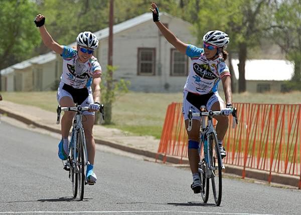 Colavita teammates Andrea Dvorak and Carmen Small cross the line side-by-side as winners in Fort Bayard after breaking away together, Tour of the Gila 2010