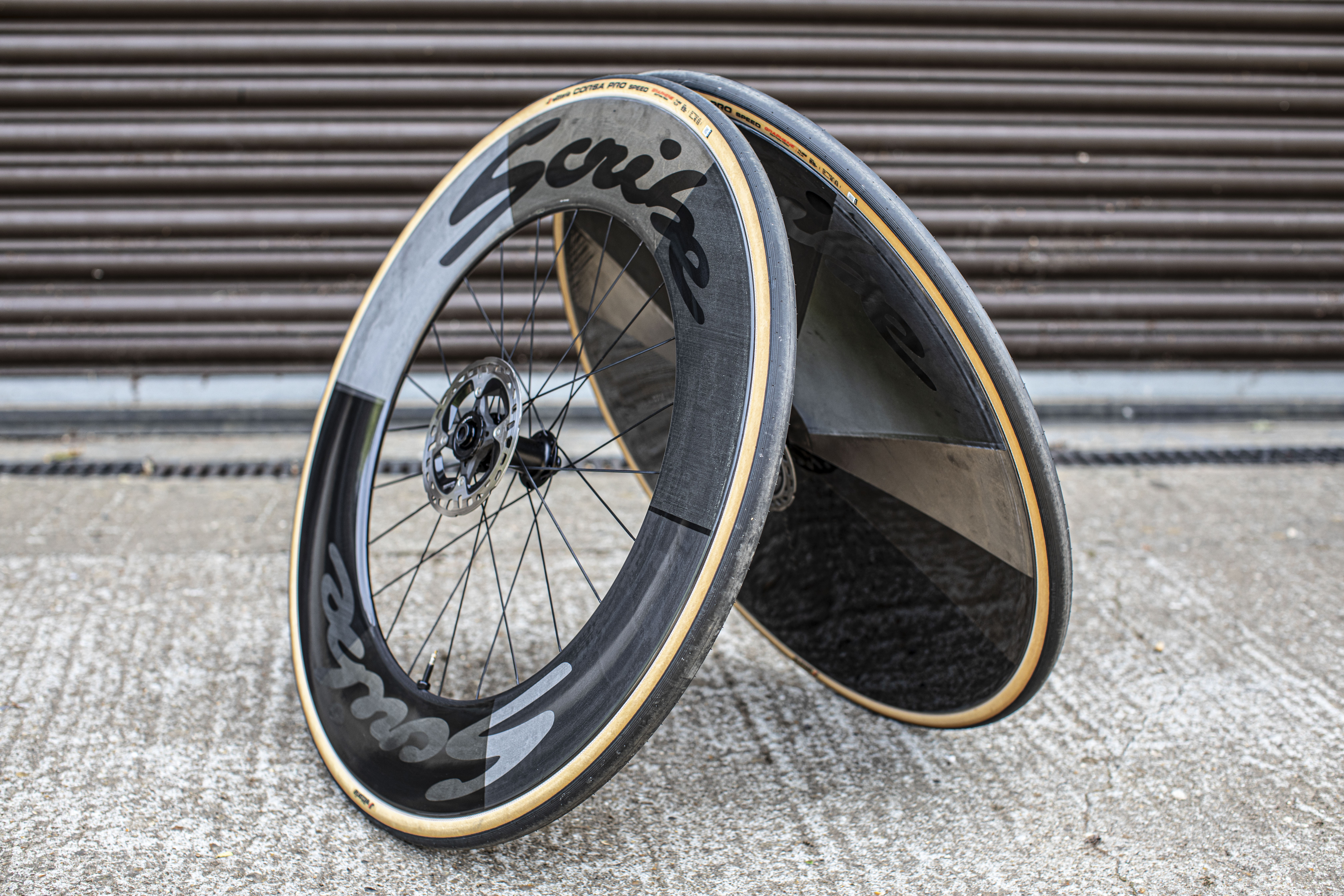Scribe Tempus Disc/100 wheelset, styled leaning up against each other