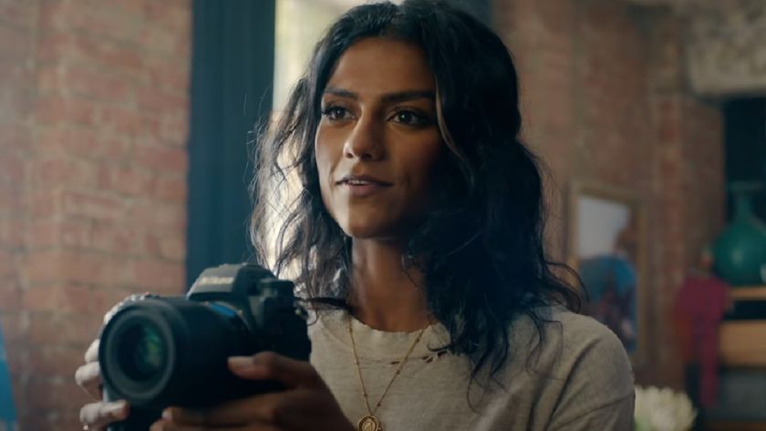 Simone Ashley holding a camera in the trailer for Picture This. 