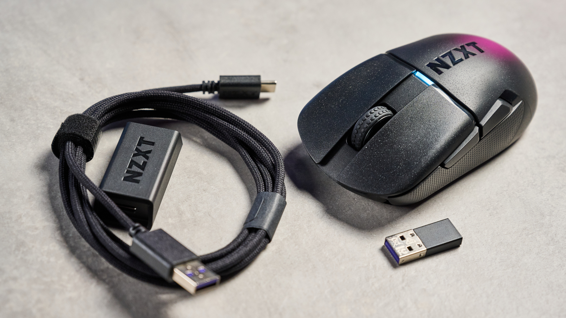 A black NZXT Lift Elite Wireless gaming mouse