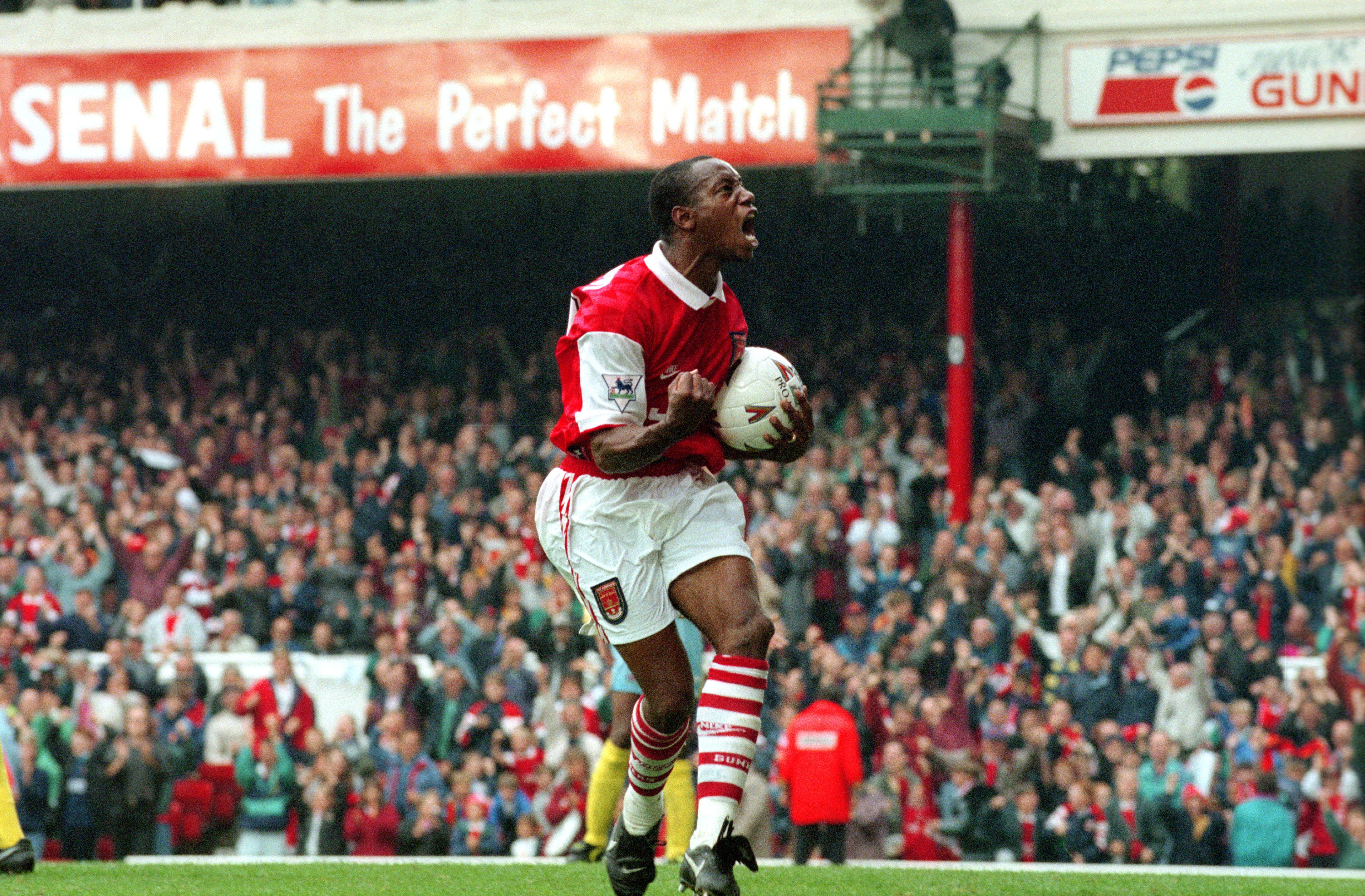 Ian Wright celebrates a goal for Arsenal against Crystal Palace in October 1994.