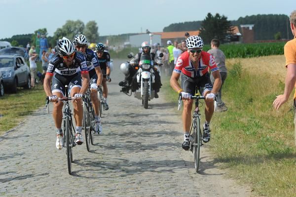 Hushovd helped establish the lead, then allowed Cancellara to take over.