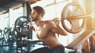 SAS endurance workout: men doing weighted squats