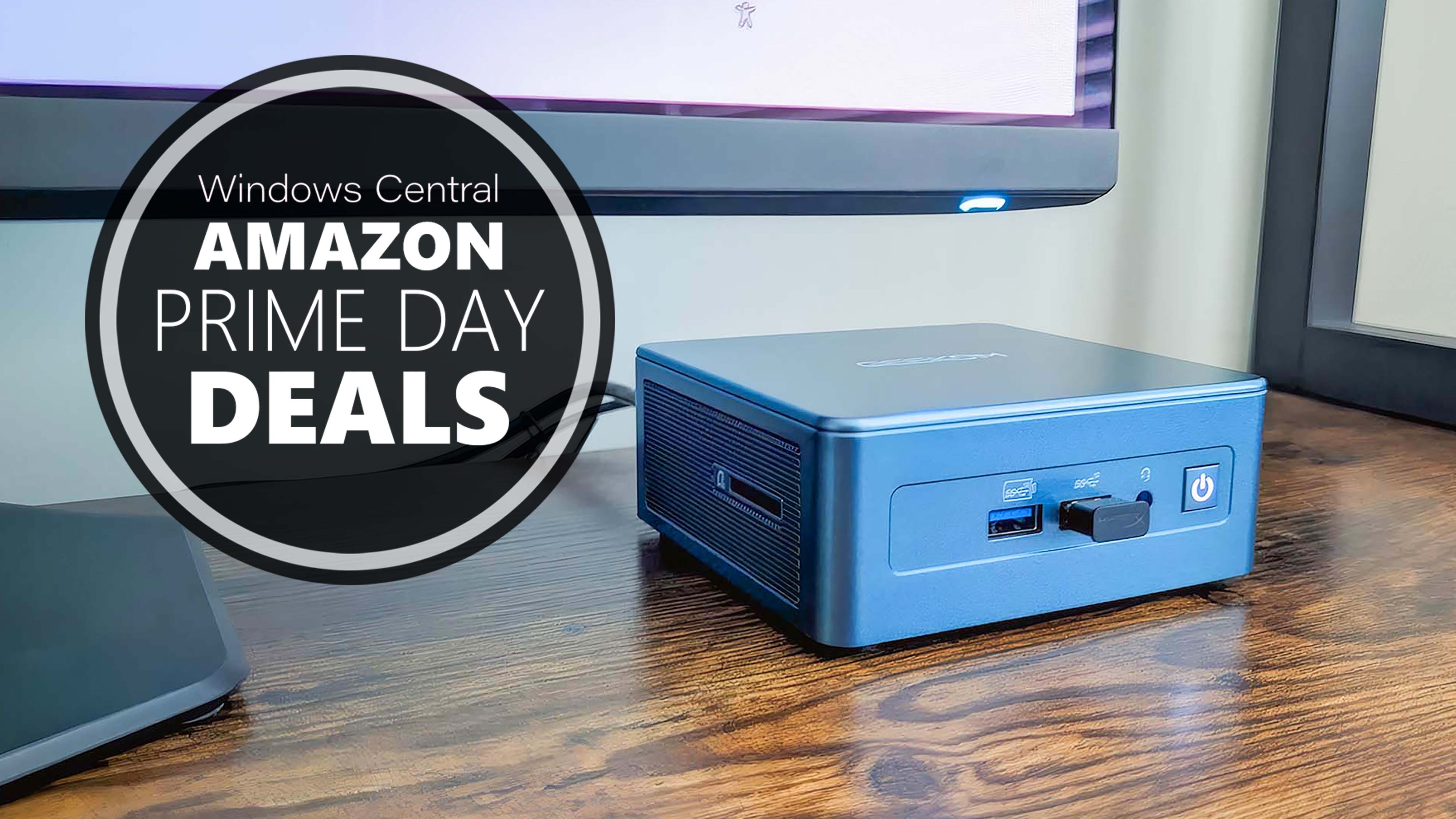 Geekom IT13 mini PC on a desk below a monitor. A graphic reads "Windows Central Amazon Prime Day Deals."