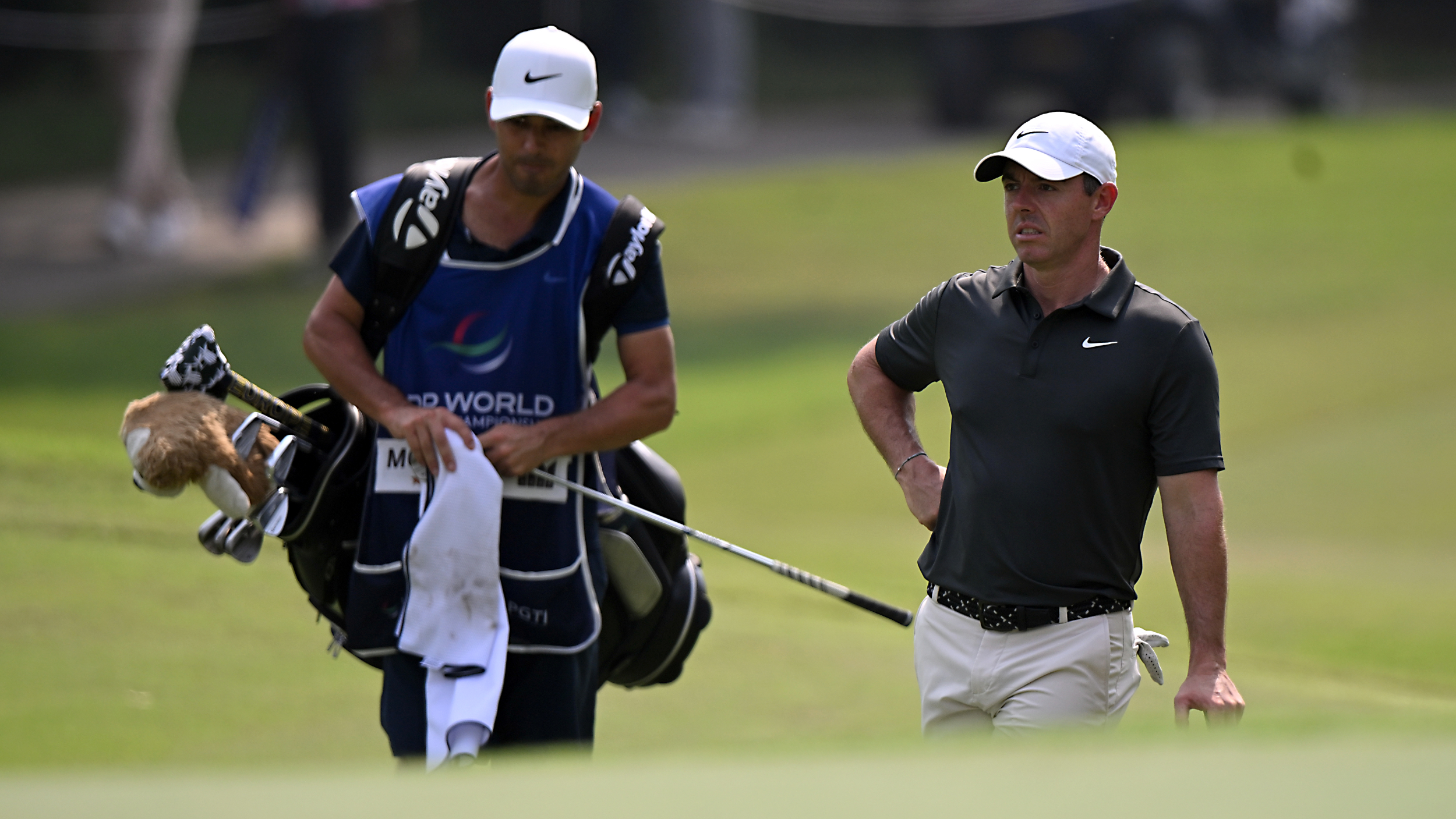 Rory McIlroy and his caddie at the DP World India Championship