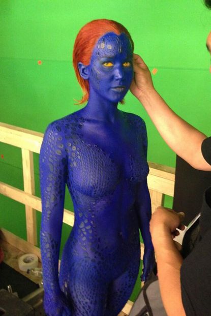 Jennifer Lawrence is painted in blue bodypaint for X-Men