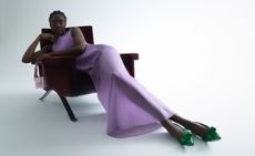 Model wears purple dress by Salvatore Ferragamo
