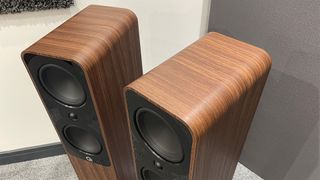 Q Acoustics 5050 floorstanding speakers from top in corner of room