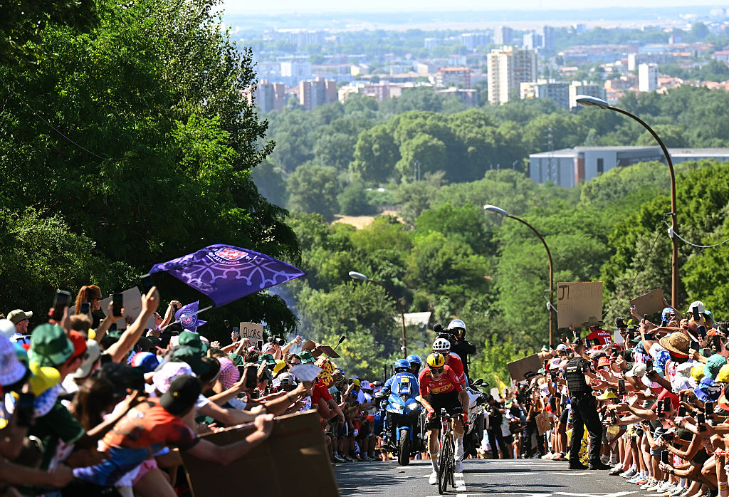 TOULOUSE, FRANCE - JULY 16: (L-R) Jonas Abrahamsen of Norway and Team Uno-X Mobility and Mauro Schmid of Switzerland and Team Jayco AlUla compete in the breakaway during the 112th Tour de France 2025, Stage 11 a 156.8km stage from Toulouse to Toulouse / #UCIWT / on July 16, 2025 in Toulouse, France. (Photo by Tim de Waele/Getty Images)