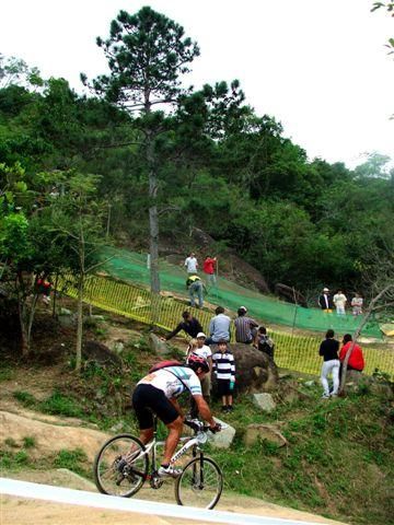 A racer zooms by in the cross country