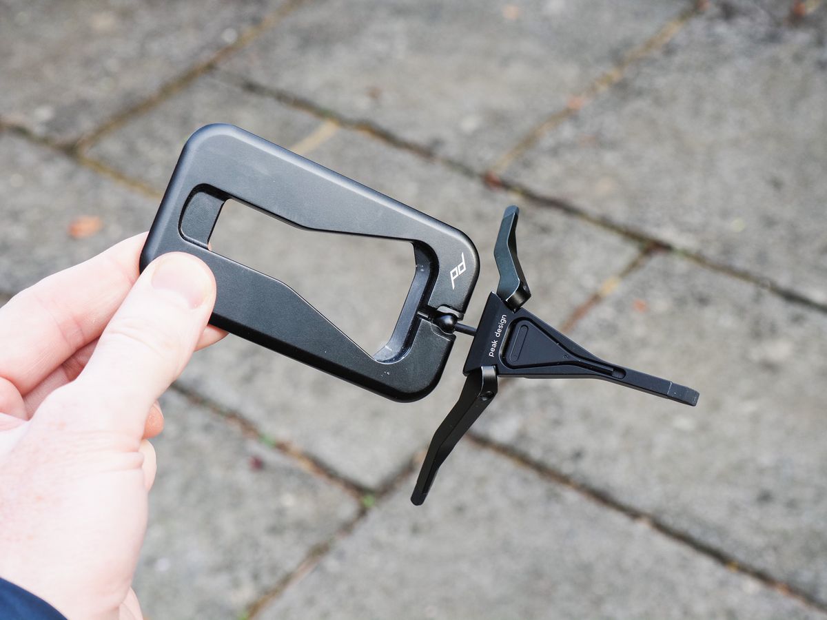 Peak Design Mobile Tripod with its legs splayed, in user's hand