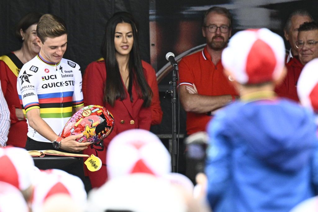 Belgian new world champion Remco Evenepoel and Remcos girlfriend Oumi Rayane pictured at the celebration of world champion Evenepoel in Dilbeek and start of a big bike ride to Brussels Sunday 02 October 2022 22 years old Evenepoel from Schepdael Dilbeek became world champion after a great season with a win at the Vuelta first Belgian in 44 years to win a big tourBELGA PHOTO JASPER JACOBS Photo by JASPER JACOBS BELGA MAG Belga via AFP Photo by JASPER JACOBSBELGA MAGAFP via Getty Images