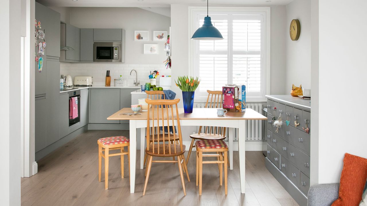 wooden chair with white wall and wooden flooring