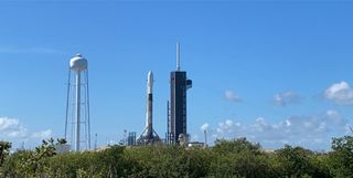 A SpaceX Falcon 9 rocket carrying 57 Starlink internet satellites and two BlackSky Global Earth-imaging satellites stands atop its Pad 39A launch site at NASA's Kennedy Space Center, Florida on July 8, 2020. The mission has been delayed since June.