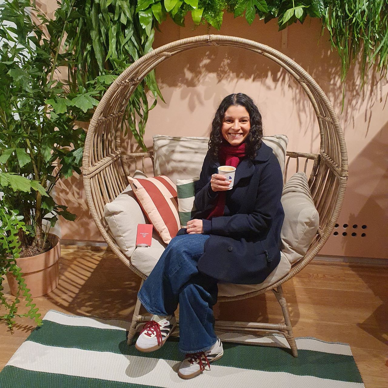 Sara sitting on the Selene garden egg chair by Habitat at the brand's press show for spring/summer 2025