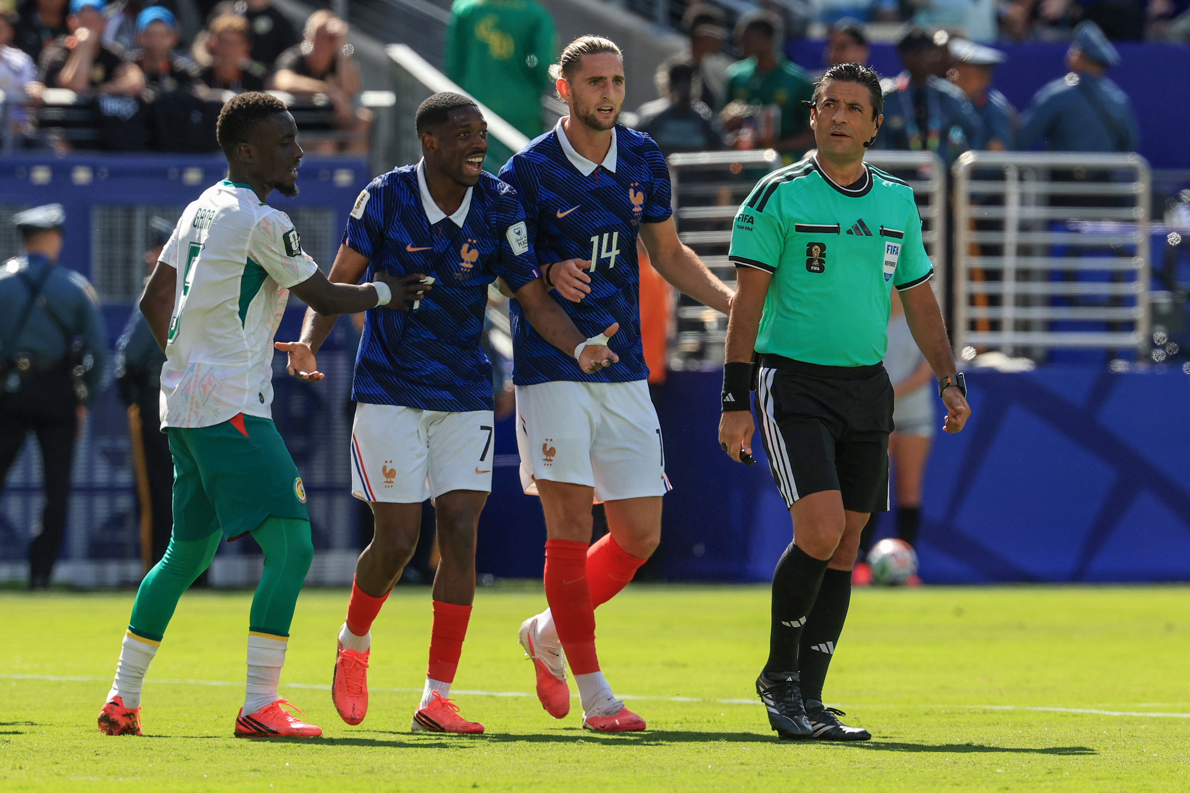 Australian referee Alireza Faghani gestures during the 2026 World Cup Group I football match between France and Senegal at the New York/New Jersey Stadium in East Rutherford on June 16, 2026.  (Photo by TIMOTHY A. CLARY / AFP)