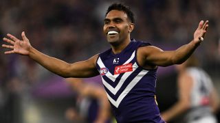 Isaiah Dudley of the Dockers celebrates a goal during the 2026 AFL First Semi Final between the Fremantle Dockers and the Geelong Cats at Optus Stadium on September 11, 2026 in Perth, Australia