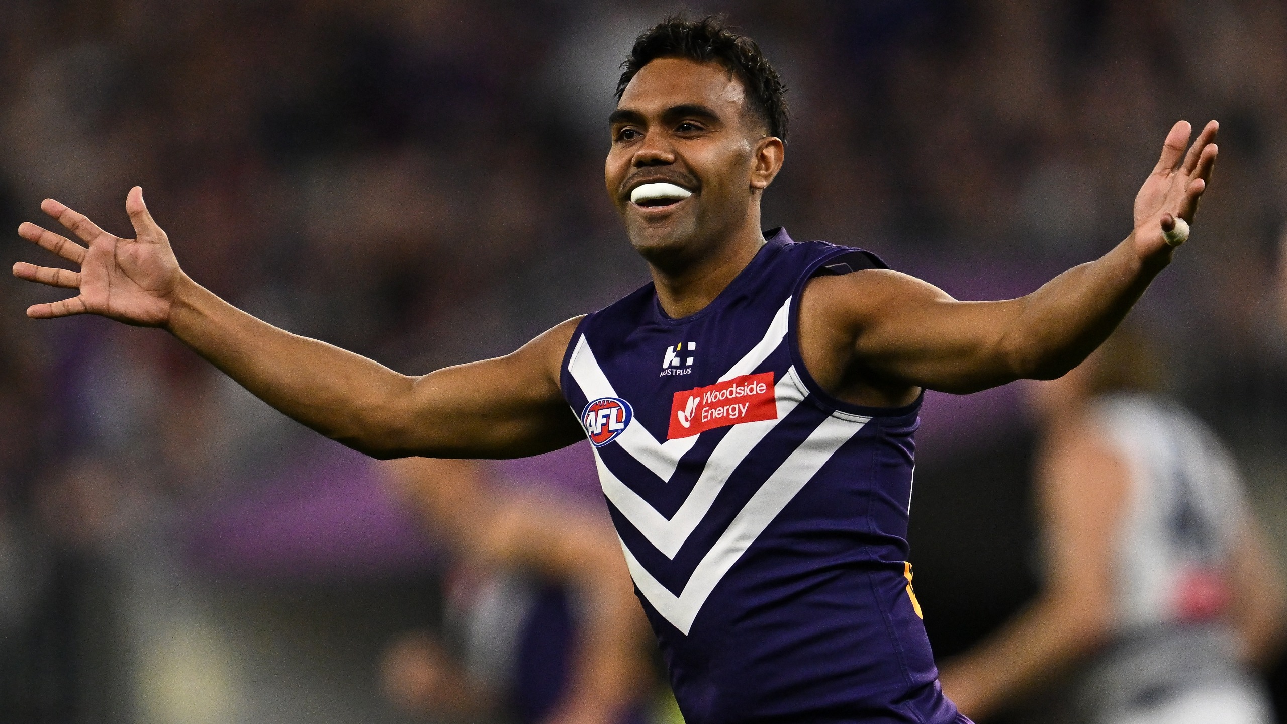Isaiah Dudley of the Dockers celebrates a goal during the 2026 AFL First Semi Final between the Fremantle Dockers and the Geelong Cats at Optus Stadium on September 11, 2026 in Perth, Australia