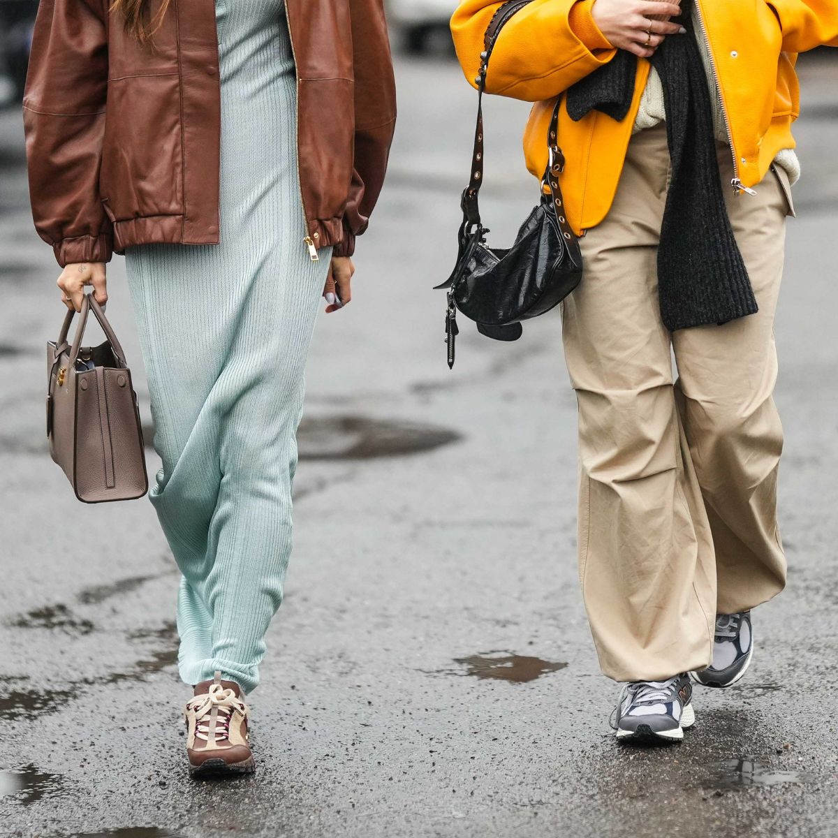 two women wearing trainers street style