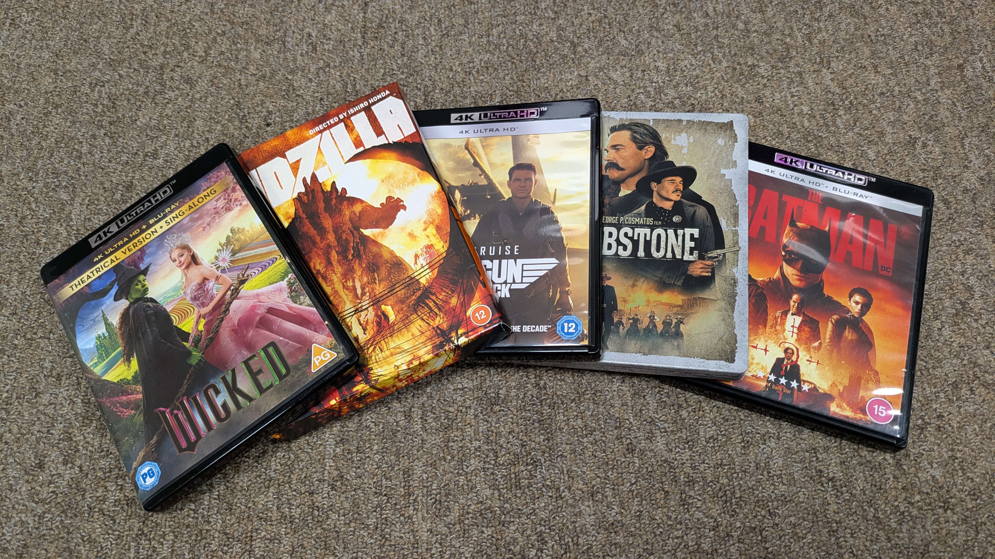 Several 4K Blu-rays including Wicked, Godzilla, Top Gun: Maverick, Tombstone and The Batman 