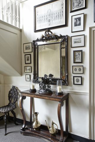 hallway_mirror_picture_frame_table_chairs_decorations