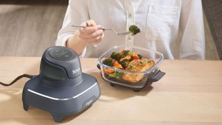 Ninja Crispi 4-in-1 Portable Glass Air Fryer making lunch