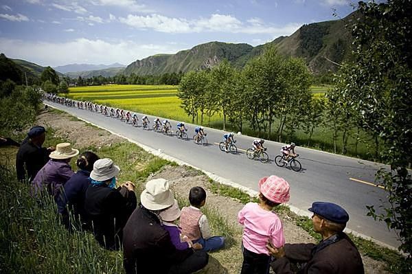 The locals come out to watch the colourful spectacle