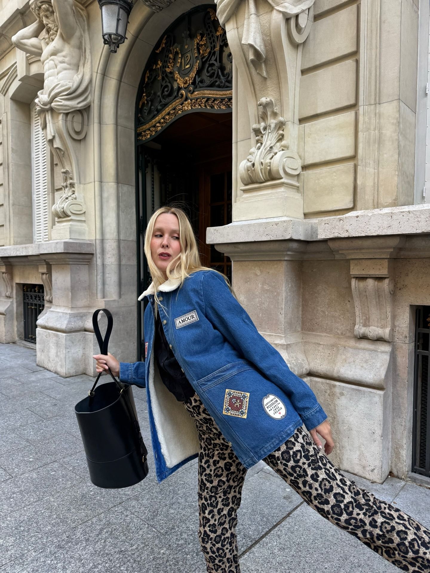 Woman wearing leopard pants.